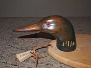 is a nice cheese or serving plate with a duck decoy head by JW DUXBURY