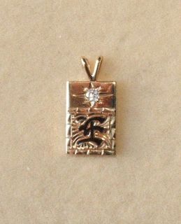 Unique 14k Gold Hawaiian Initial Pendant with Diamond Letter E