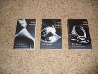 Fifty Shades of Grey Trilogy by E. L. James   Paperback