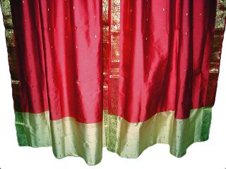  Window curtains with golden floral border certainly make an elegant
