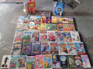 51 VHS tapes and 2 dvd games