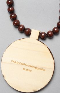 Gold Coin Hieroman Woodallion necklace