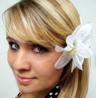 lily flowers back to back on an alligator clip this artificial flower