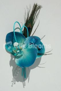 Jade Green and Galaxy Blue Orchid and Peacock Feather Corsage