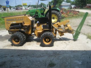 Used Case Trencher with Homemade Steel Fence Post Driver