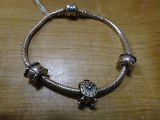 Pandora 7 1 2 Sterling silver Charm Bracelet w 3 Charms Nice Condition
