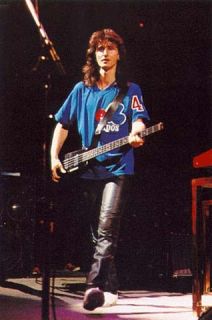 Great vintage shot of Geddy Lee with his Steinberger. His band RUSH