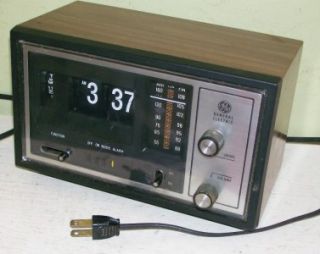 vintage general electric electric flip radio alarm clock model no 7
