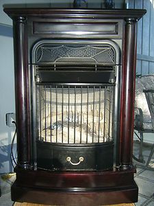 Charmglow Gas Indoor Fireplace / Fan Forced Heater. Solid Wood Cabinet