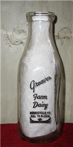 We have a Black Pyro Milk Bottle from Greaves Farm Dairy, Morrisville