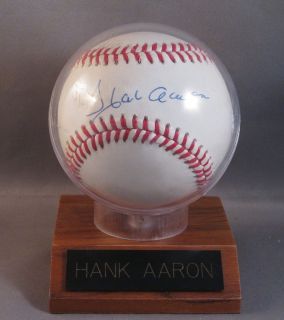 HANK AARON SIGNED BASEBALL WITH C.O.A. HOLDER & NAMEPLATE AUTOGRAPHED
