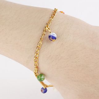 EUR € 1.28   elegante braccialetto doro con globulo colorato