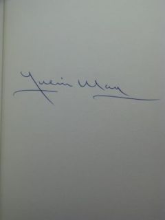 We have lots of autographed Julian May first editions and other rare