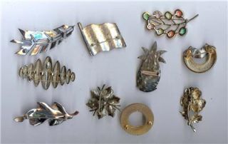 On offer is this collection of costume jewelry pins / brooches .