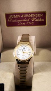 Jules Jurgensen Ladies Gold Bracelet White Dial Watch