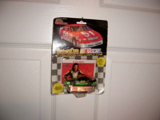 42 Kyle Petty 1992 Mello Yellow Pontiac 1 64 Car with Collectors Card