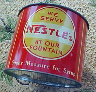 Vintage antique Nestles at our fountain sugar measure for syrup Peter