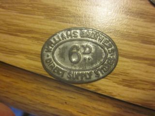 WILLIAMS BROS DIRECT SUPPLY STORES SIXPENCE 6D TOKEN OVAL Coin
