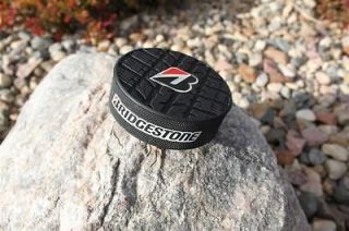 Bridgestone Blizzak TIRE Hockey Puck ~ Promo Item ~ NFL/NBA/NHL ~ LIKE