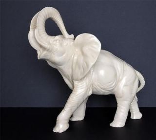 Vintage FAUX IVORY RESIN ELEPHANT figurine trumpeting raised trunk 9 1