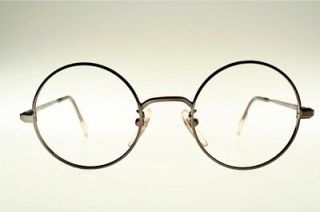 Thin and round shiny dark metallic brown Eyeglasses by DESIL Mod
