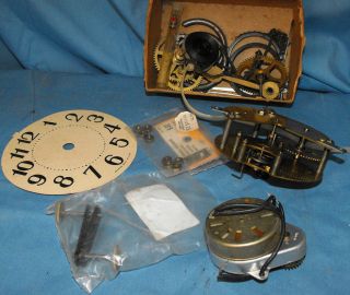 Small Box of Clock Parts. Chime, Small Movement, Paper Face, Hands