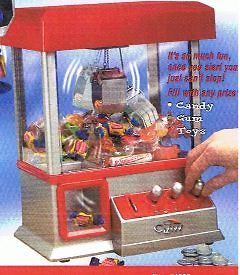 The Claw Electronic Candy Toy Machine Arcade Game w/Music Portable
