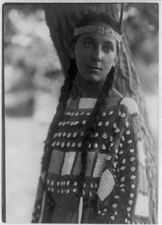 Young Native American woman,clothing,headdress,Indians,E Curtis,c1907