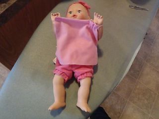 The sweetest baby doll She plays peek a boo with her blanky.Says lota