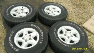  DODGE RAM 1500 16 INCH OEM WHEELS AND TIRES W CENTER CAPS INCLUDED