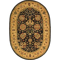 Handmade Antiquities Mashad Black/ Ivory Wool Rug (46 X 66 Oval) (BlackPattern OrientalMeasures 0.625 inch thickTip We recommend the use of a non skid pad to keep the rug in place on smooth surfaces.All rug sizes are approximate. Due to the difference o