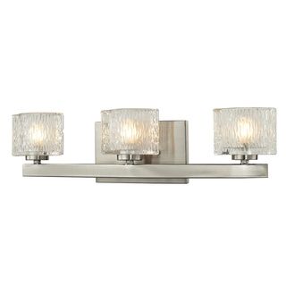 Rai Brushed Nickel 3 light Vanity Light With Clear Glass (SteelSetting IndoorFixture finish Brushed nickelShades Clear glassNumber of lights Three (3)Requires three (3) 75 watt G9 bulb (included)Dimensions 5.375 inches high x 20 inches wide x 3.625 i