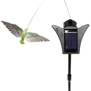 Solar Powered Dancing Chartreu Green Hummingbird Garden Accent (ABS, metal, plasticPackage content Two (2) X interconnect plastic poles, one (1) X ground stake, one (1) X hummingbird anchored by a wire, one (1) X solar panel with internal spinning)