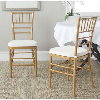 Safavieh Carly Gold Side Chairs (set Of 2) (GoldMaterials ResinFinish NaturalSeat dimensions 15.7 inches wide x 15.7 inches deepSeat height 17.3 inchesDimensions 35.8 inches high x 16.1 inches wide x 16.5 inches deepProduct will ship to you in one (1