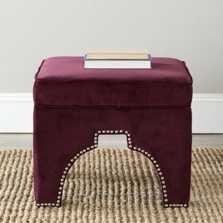 Safavieh Sahara Bordeaux Red Nailhead Ottoman (Bordeaux RedMaterials Plywood and cotton fabricSeat height 17.9 inchesDimensions 17.9 inches high x 21.3 inches wide x 21.3 inches deepThis product will ship to you in 1 boxFurniture arrives fully assemble