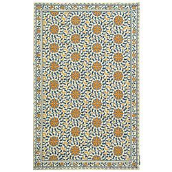 Hand hooked Majestic Ivory/ Blue Wool Rug (53 X 83) (IvoryPattern FloralMeasures 0.375 inch thickTip We recommend the use of a non skid pad to keep the rug in place on smooth surfaces.All rug sizes are approximate. Due to the difference of monitor color