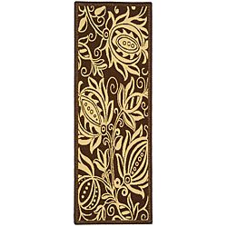 Indoor/ Outdoor Andros Chocolate/ Natural Runner (24 X 67) (BrownPattern FloralMeasures 0.25 inch thickTip We recommend the use of a non skid pad to keep the rug in place on smooth surfaces.All rug sizes are approximate. Due to the difference of monitor