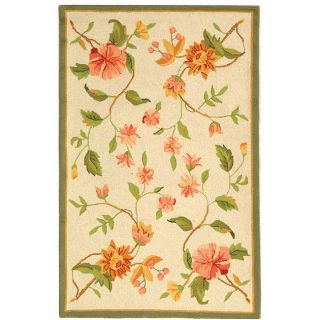 Hand hooked Garden Ivory Wool Runner (26 X 4) (IvoryPattern FloralMeasures 0.375 inch thickTip We recommend the use of a non skid pad to keep the rug in place on smooth surfaces.All rug sizes are approximate. Due to the difference of monitor colors, som