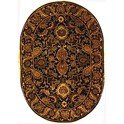 Handmade Classic Regal Black/ Burgundy Wool Rug (76 X 96 Oval) (BlackPattern OrientalMeasures 0.625 inch thickTip We recommend the use of a non skid pad to keep the rug in place on smooth surfaces.All rug sizes are approximate. Due to the difference of 