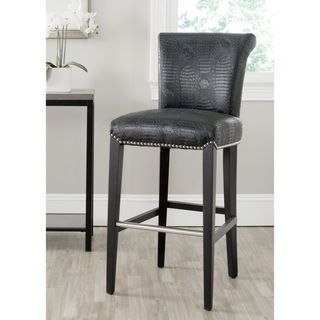 Safavieh Seth Black Crocodile Leather Bar Stool (30 Inche) (Black crocIncludes One (1) stoolMaterials Iron, birch wood and bicast leatherFinish BlackSeat dimensions 18.7 inches width and 16.6 inches depthSeat height 29.3 inchesDimensions 43.5 inches