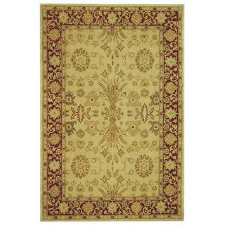 Handmade Mashad Ivory/ Red Wool Rug (5 X 8) (IvoryPattern OrientalMeasures 0.625 inch thickTip We recommend the use of a non skid pad to keep the rug in place on smooth surfaces.All rug sizes are approximate. Due to the difference of monitor colors, som